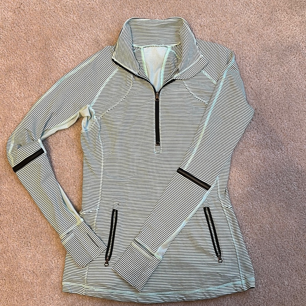 Women’s Lululemon size 8 running top 1/2 zip. Pale green and black stripes